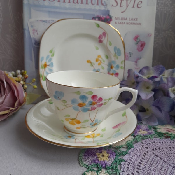 Pretty Antique Art Deco Trio Teacup & Saucer With Teaplate in Handpainted Pastel Flowers by H M Sutherland