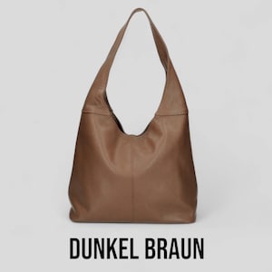 May include: A brown leather hobo bag with a single strap. The bag is on a white background and the text "Dunkel Braun" is below the bag.