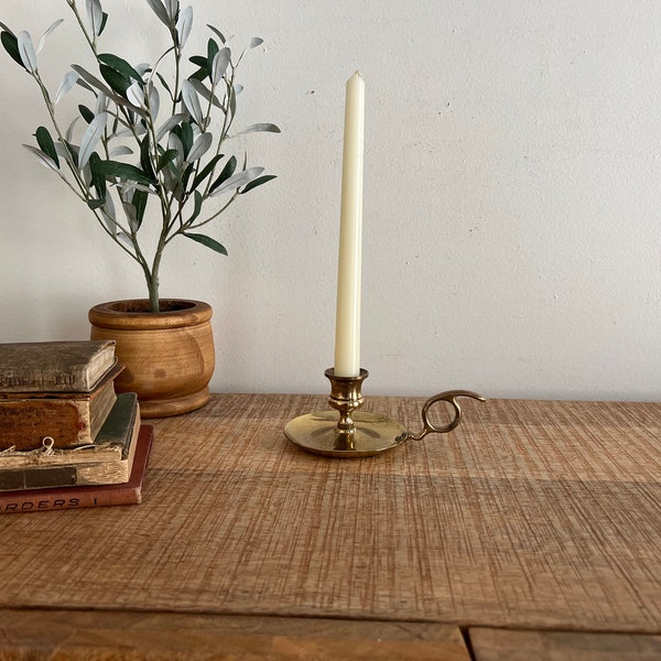 Brass candlestick with handle