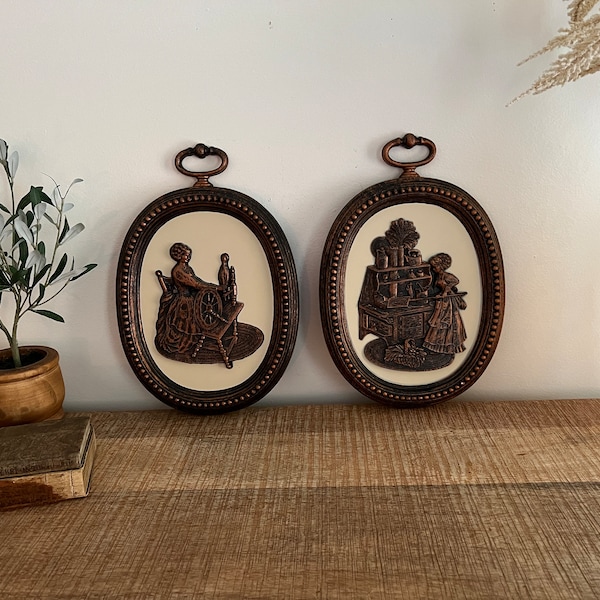 Vintage Mid Century Bronze/Black Cooper craft Women Spinning/cooking wall plaques set of 2