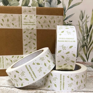 May include: Four rolls of white packing tape with a green leaf pattern and the text "I'm eco-friendly, please recycle me".
