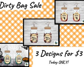 May include: Three pairs of dangling earrings shaped like glass jars with cork stoppers. The designs feature labels reading Love Potion with a cupid, Eye of Newt with a lizard, and Poison with a skull and crossbones graphic.