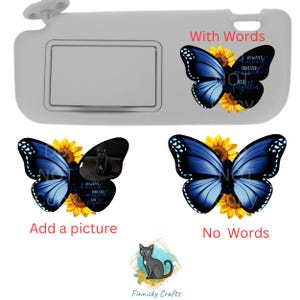 May include: A gray car sun visor with a blue butterfly and sunflowers. The butterfly has the words "Always Loved Forever Missed" written on it. There is also a version of the visor with a black cat and the same butterfly and sunflowers without the words.