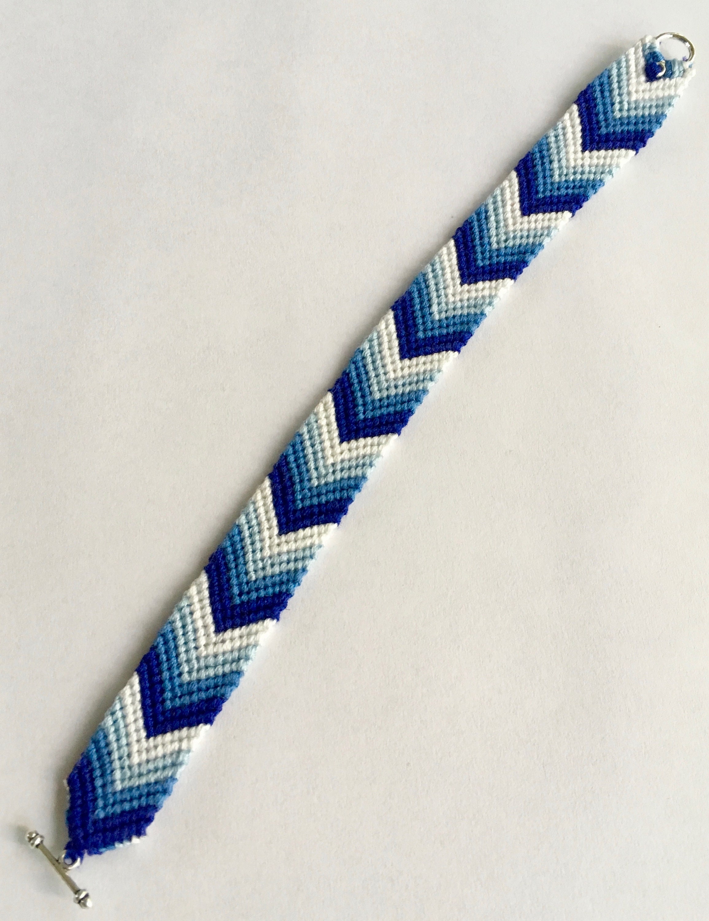 Searching for braided friendship bracelet patterns? Maybe this blue nylon  thread brac…