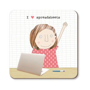 May include: A square coaster featuring a cartoon illustration of a person with short brown hair, wearing a pink dress with white stars, and a laptop. The text "I ❤️ spreadsheets" is at the top.