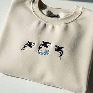 Embroidered Orca Whale Sweatshirt, Trio of Killer Whales Ocean Shirt, Coastal Marine Life Crewneck, Sea Animal Gift for Nature Lovers