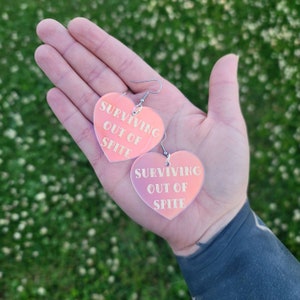 Surviving out of Spite Frosted Iridescent Heart Earrings