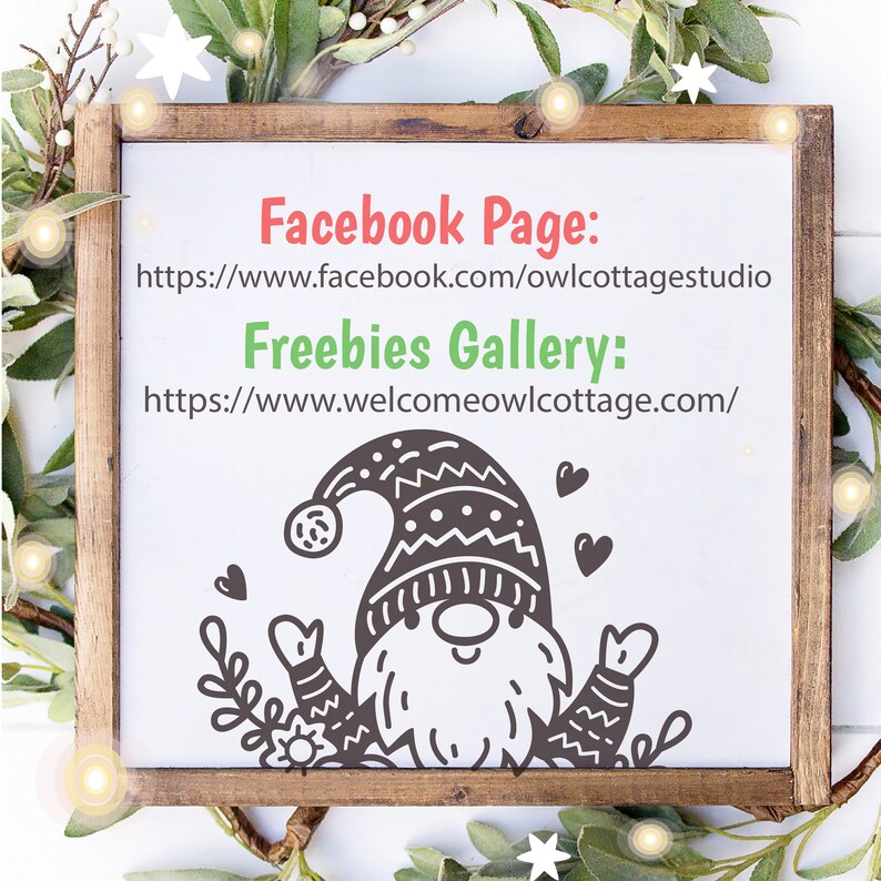 May include: A white sign with a brown wooden frame, featuring a cartoon gnome with a red hat and a white background. The sign includes the text "Facebook Page: https://www.facebook.com/owlcottagestudio" and "Freebies Gallery: https://www.welcomeowlcottage.com/"