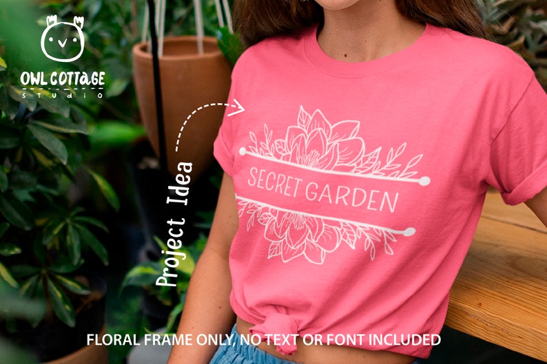 May include: A pink t-shirt featuring a white floral design and the text "SECRET GARDEN".