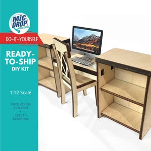May include: A wooden desk with a computer, chair, and two bookshelves. The desk is made of light wood and has a dark wood trim. The computer is a silver laptop with a black keyboard. The chair is a wooden chair with a black seat. The bookshelves are made of light wood and have two shelves each. The desk is a 1:12 scale model and is a DIY kit.