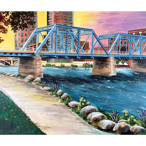 K&ouml;nnte beinhalten: Ein Gem&auml;lde einer blauen Br&uuml;cke &uuml;ber einem Fluss mit einem Weg, der zu ihr f&uuml;hrt. Die Br&uuml;cke ist aus Stahl und hat ein h&ouml;lzernes Deck. Der Fluss ist blau und hat Wellen auf der Oberfl&auml;che. Der Weg ist aus Erde und hat auf beiden Seiten gr&uuml;nes Gras. Im Hintergrund sind B&auml;ume und Geb&auml;ude zu sehen.