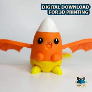 Puede incluir: Un personaje de maíz dulce impreso en 3D con alas. El personaje tiene la parte superior blanca, la parte media naranja y la parte inferior amarilla. Tiene ojos grandes y una boca pequeña. Las alas son naranjas y tienen una ligera curva.