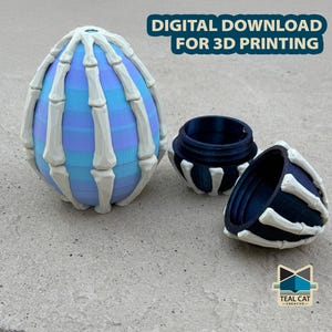 May include: A 3D-printed egg-shaped container with a skeleton bone design. The egg is blue and white, with a matching lid and base. The text "DIGITAL DOWNLOAD FOR 3D PRINTING" is at the top.
