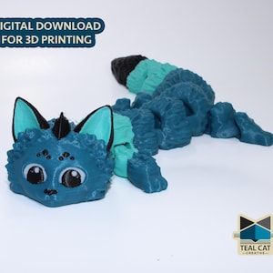 May include: A teal blue 3D printed cat figurine with a segmented body and large eyes. The cat has a black horn on its head and a fluffy tail.