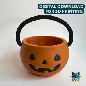 May include: Orange pumpkin-shaped Halloween treat bucket with a black handle. The bucket has a carved jack-o'-lantern face.