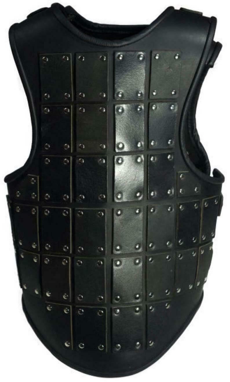May include: Black leather vest with a grid pattern of square plates, each secured with silver rivets.
