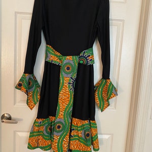 Made to order Black polyester dress, with African fabric trim