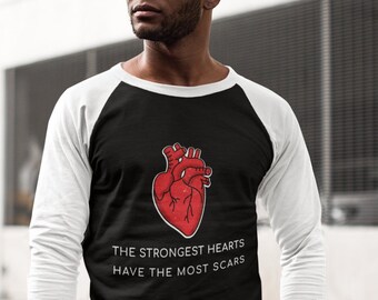 Los corazones más fuertes tienen la mayor cantidad de cicatrices Camisa raglan unisex de manga 3/4, CHD, defecto cardíaco congénito
