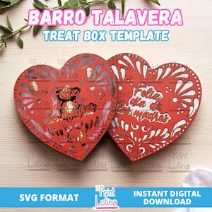 May include: Red heart-shaped treat box template with intricate cut-out designs. The box features the text "Feliz dia de las madres" and "Barro Talavera Treat Box Template". The design includes floral and decorative patterns, perfect for Mother's Day.