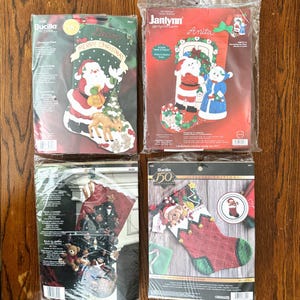 May include: A set of three ceramic mugs with a speckled, matte finish. The mugs are in shades of cream, light gray, and dark gray. Each mug has a simple, minimalist design and a rounded handle. The mugs are likely for coffee or tea.