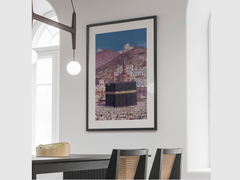 May include: A framed photograph of a mosque with a large crowd of people in front of it. The mosque is a large, white building with a black dome. The crowd is made up of people of all ages and genders. The photograph is taken from a high angle, looking down on the mosque and the crowd.