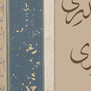 May include: A close-up of a blue and gold framed wall panel with a beige background. The panel has a decorative design with gold leaf accents. The background is a light beige color.