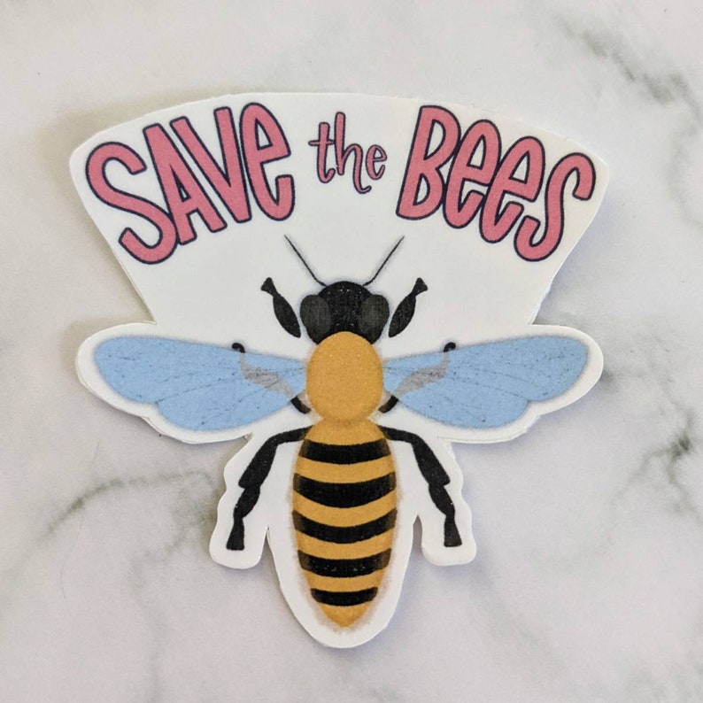 May include: A sticker with a bee illustration and the text "Save the Bees" in pink lettering.