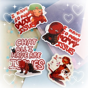 May include: Four stickers featuring cartoon illustrations and text. One sticker says "I HAVE SO MANY DADDY ISSUES", another says "I HAVE SO MANY MOMMY ISSUES". The other two stickers say "CHAT ALL I HAVE ARE ISSUES" and "SHOT THROUGH THE HEART".