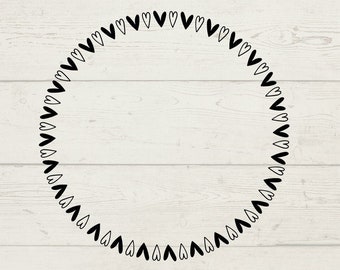 May include: A black and white circle frame made of small hearts. The frame is perfect for adding a personal touch to your crafts.