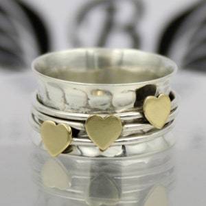 Sterling Silver Spinner Ring: Handmade Hammered Meditation Ring with Brass Hearts