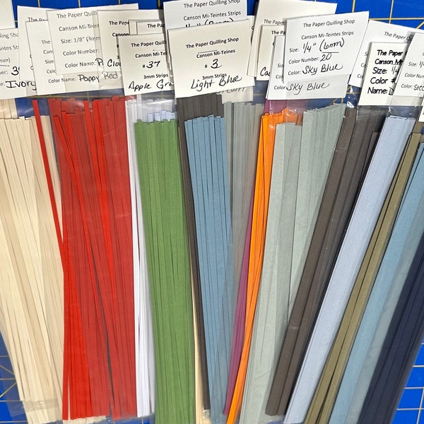 Bandes de Quilling Papier Canson Mi-Teintes Ultra Premium 1/4" ou 6 mm, 160 g/m² en 46 couleurs dans des paquets de 50 bandes.