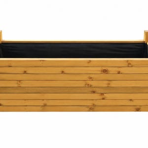 May include: A rectangular wooden planter box featuring horizontal slats and four sturdy corner posts. The interior of the planter is lined with a solid black fabric material, providing a contrast to the natural light brown wood grain finish.
