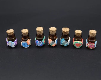 Surtido de 10 botellas miniatura, botellas de vidrio con corcho, botellas artesanales, mini botellas, botellas de vidrio pequeñas, botellas diminutas de 24 x 18 mm y 1 ml.