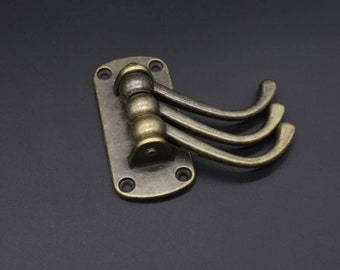 The furniture hanger is triple, Vintage Swivel Brass Triple Wall Hook, Swivel Triple Hook, Wall hook, Rotating swivel hook 80x80 mm