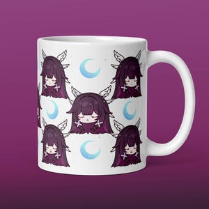 May include: White ceramic mug featuring a repeating pattern of a cartoon character with long purple hair, angel wings, and a cross on the chest. Light blue crescent moons are also scattered across the mug.