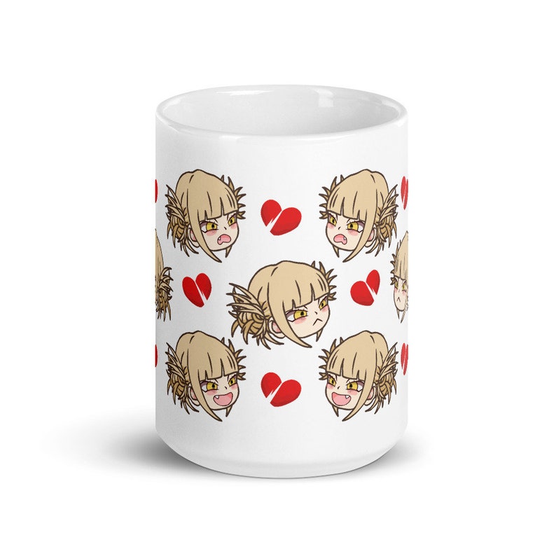 May include: White ceramic mug with a repeating pattern of a cartoon character with yellow hair and a red broken heart.