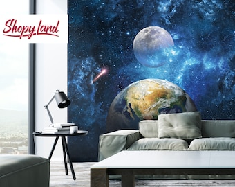 May include: A wall mural featuring a blue and black space scene with a large moon and a planet Earth. The mural is displayed in a modern living room with a couch, coffee table, and floor lamp.