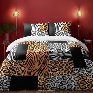 May include: A twin-size bedding set with a patchwork design featuring various animal prints, including zebra, leopard, and tiger stripes. The bedding is black, white, brown, and orange.