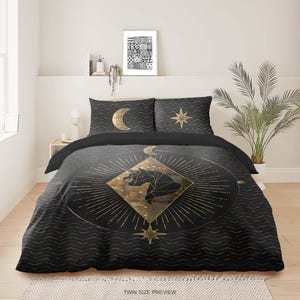 May include: Black and gold duvet cover with a geometric unicorn design, moon and star accents, and a chevron pattern.