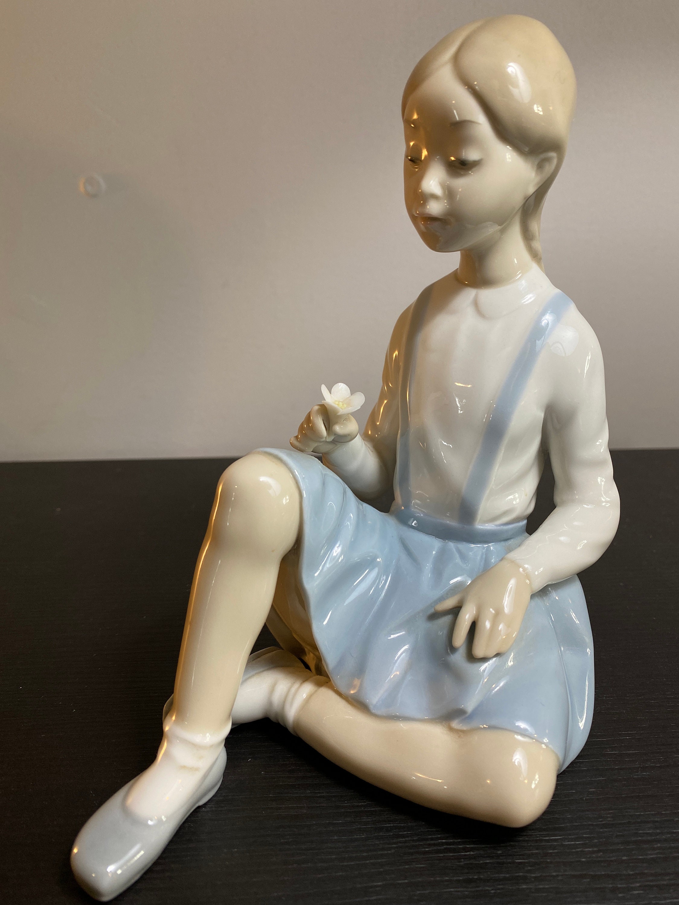 Lladro Porcelain Figure of Girl sitting holding Flower Etsy