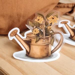 Adesivo de flores de regador chuvoso | Vinil, transparente, fosco | Outono Outono Chuva Floral Natureza Cottage Core Boho | Laptop, Thermos, Journaling