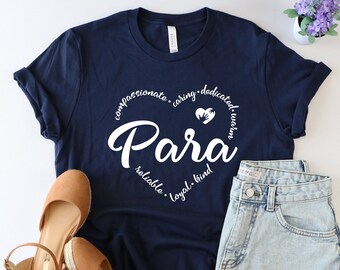 May include: A navy blue t-shirt with a white heart design that says "Para" inside the heart. The heart is surrounded by the words "compassionate, caring, dedicated, warm, reliable, loyal, kind".