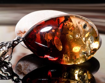 Elegant Cherry Gold Baltic Amber Pendant with Unique Design