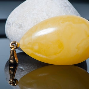 Yellow Baltic Amber Pendant: Gold Plated Sterling Silver