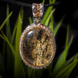 Amber pendant with natural untreated crust underneath, Modern green amber pendant