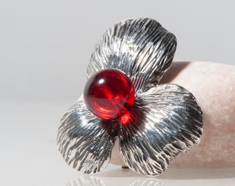 Silver pendant with ruby amber: an exclusive work of art, Exclusive amber pendant with red stone