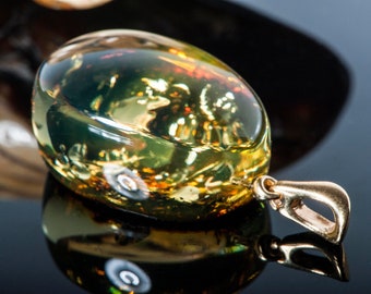 Beautiful amber pendant with natural crust underneath, Amber pendant with beautiful glitters, Green amber pendant, Green stone jewelry