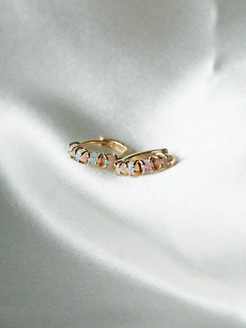 Opal encrusted 24k gold huggie hoop earrings