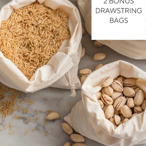 May include: Two white cotton drawstring bags, one filled with brown rice and the other with pistachios. The text "2 BONUS DRAWSTRING BAGS" is printed on a white rectangle.