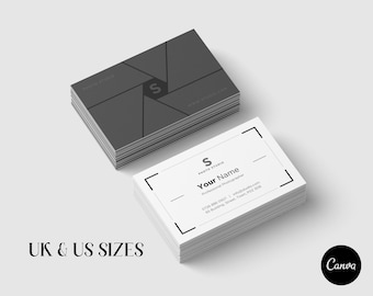 May include: Two stacks of business cards. The top stack has a dark grey design resembling a camera aperture. The bottom stack has a white background with the text "Your Name" and "Photo Studio". The Canva logo is in the bottom right corner.